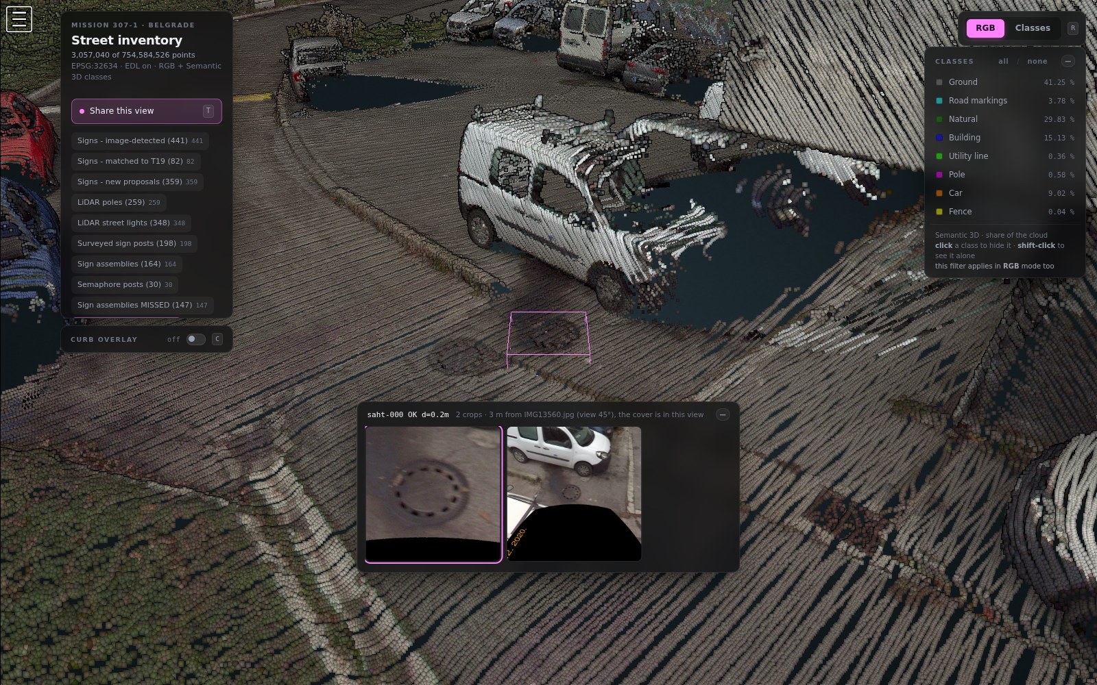 A manhole in the point cloud with its close-up photograph from the panorama.